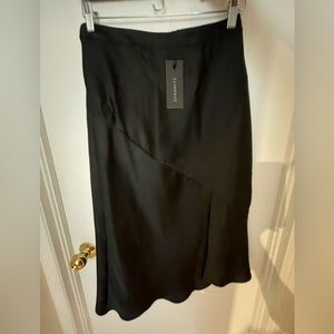 NEW WITH TAGS Black satin skirt asymmetric hem